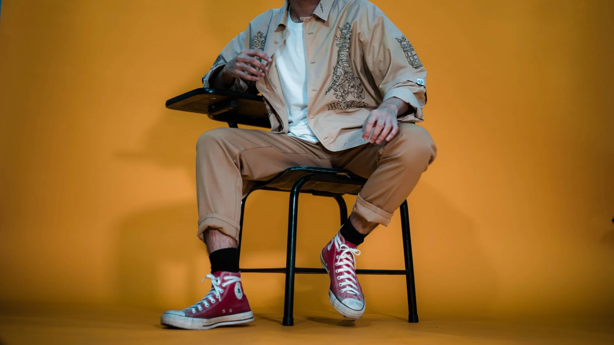 Red Converse on yellow — 2019